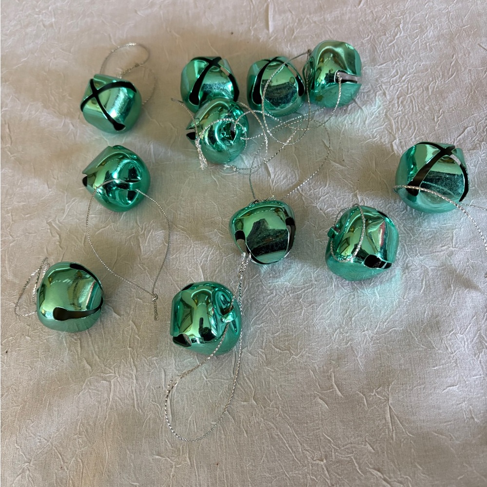 11 Teal 1" round Jingle Bells